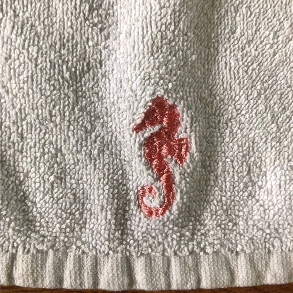 white wash cloths with embroidered seahorses set of 2